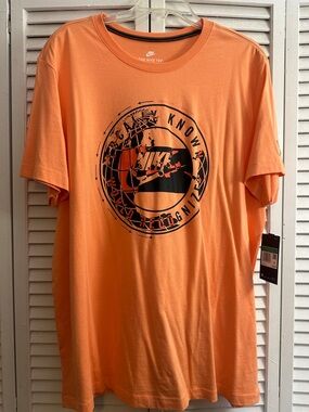 Nike Orange Short Sleeve Graphic Tee with Black Print